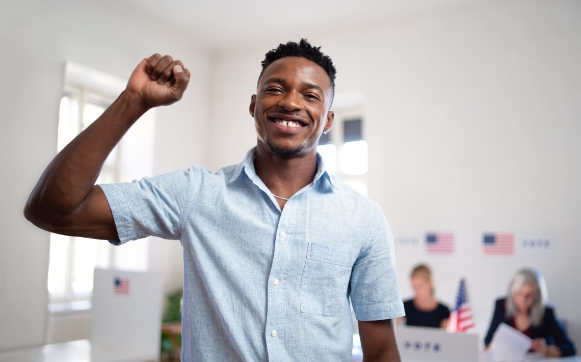 happy-african-american-man-voter-looking-at-camera-7KDNQCF.jpg